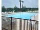 Community pool with plenty of chairs at 305 Grande Lake Dr, Daytona Beach, FL 32124