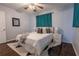 This bedroom features soft lighting, a comfortable bed, and modern curtains, creating a relaxing atmosphere at 3300 Needles Dr, Orlando, FL 32810
