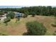 Neighborhood park showcasing playground, playfield, and open space surrounded by trees and homes at 3620 Benson Park Blvd, Orlando, FL 32829