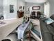 A large living space with tile floors, comfortable seating, and decor at 3620 Benson Park Blvd, Orlando, FL 32829