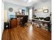Spacious office with rich hardwood floors and custom cabinets at 3620 Benson Park Blvd, Orlando, FL 32829