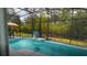 The sun-drenched pool has green forest views at 3620 Benson Park Blvd, Orlando, FL 32829