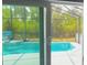 Screened-in pool area offering seamless indoor-outdoor living at 3620 Benson Park Blvd, Orlando, FL 32829