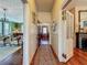 Hallway that showcases hardwood floors and seamless transition to another room at 420 S Oak Ave, Sanford, FL 32771