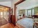 Elegant living room featuring hardwood floors, fireplace, and detailed ceiling at 420 S Oak Ave, Sanford, FL 32771
