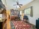 Bright office space with built-in bookshelves, comfortable desk, and large window at 420 S Oak Ave, Sanford, FL 32771