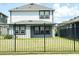 Fenced backyard with green grass at 6268 Great Bear Dr, Lakeland, FL 33805