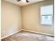 Clean bedroom with neutral carpet, a window, and a blank canvas for personalization at 6268 Great Bear Dr, Lakeland, FL 33805
