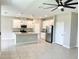 Spacious open kitchen with granite countertops, stainless steel appliances, and ample cabinet space at 6268 Great Bear Dr, Lakeland, FL 33805