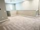 Carpeted loft area with natural light, offering flexible living space at 6268 Great Bear Dr, Lakeland, FL 33805