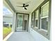 Covered patio area with ceiling fan, and plenty of natural light at 6268 Great Bear Dr, Lakeland, FL 33805