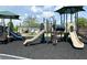 Community playground with slides and climbing structures, perfect for Gathering fun and recreation at 6268 Great Bear Dr, Lakeland, FL 33805