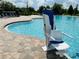 Convenient pool access with specialized lift for persons with disabilities at 6268 Great Bear Dr, Lakeland, FL 33805