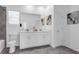 Stylish bathroom with a double vanity, modern fixtures, and a well-lit mirror for grooming at 6328 Whip O Will Ln, St Cloud, FL 34771