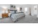 Cozy bedroom featuring plush carpet, stylish decor, and serene ambiance at 6328 Whip O Will Ln, St Cloud, FL 34771
