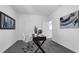 Neutral home office featuring an modern style desk, neutral decor, and lots of natural light at 6328 Whip O Will Ln, St Cloud, FL 34771