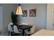 Chic dining area featuring modern pendant lighting and stylish decor for intimate meals at 639 Longboat Dr, Davenport, FL 33896