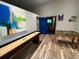 Fun game room with shuffleboard, foosball, and blue doorway to an arcade at 639 Longboat Dr, Davenport, FL 33896
