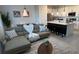 Open concept living space featuring a kitchen, living room, and dining area at 639 Longboat Dr, Davenport, FL 33896