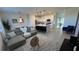 Open concept living space featuring a kitchen, living room, and dining area at 639 Longboat Dr, Davenport, FL 33896