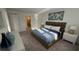 Bedroom with a view, featuring a spacious layout, natural lighting, and a dresser at 639 Longboat Dr, Davenport, FL 33896