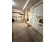 Unfinished basement with concrete floor and exposed utilities at 702 Willie Mays Pkwy, Orlando, FL 32811