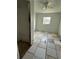 Bedroom with tile flooring, natural light and ceiling fan at 702 Willie Mays Pkwy, Orlando, FL 32811