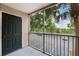 This screened patio provides outdoor living space with beautiful views of lush landscaping at 7511 Seurat St # 10207, Orlando, FL 32819