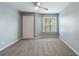 Neutral bedroom with carpet, ceiling fan, window, and closet at 7511 Seurat St # 10207, Orlando, FL 32819