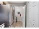Convenient laundry room with appliances and additional storage space off the kitchen at 7511 Seurat St # 10207, Orlando, FL 32819