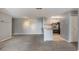 Spacious living room adjacent to the kitchen, offering a comfortable and versatile living space at 7511 Seurat St # 10207, Orlando, FL 32819