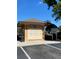Mailbox station featuring multiple boxes and a bulletin board, set in a neatly landscaped community area at 7511 Seurat St # 10207, Orlando, FL 32819