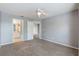 Neutral main bedroom with carpet and attached bath at 7511 Seurat St # 10207, Orlando, FL 32819
