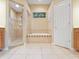 A spacious bathroom featuring a shower, tub, and tile flooring at 7513 Brightwater Pl, Oviedo, FL 32765