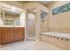 A bathroom featuring a shower, tub, vanity, and tile flooring at 7513 Brightwater Pl, Oviedo, FL 32765