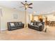 A spacious living room that opens into a dining and kitchen area at 7513 Brightwater Pl, Oviedo, FL 32765
