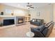 A spacious living room featuring a fireplace and comfortable seating at 7513 Brightwater Pl, Oviedo, FL 32765
