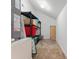 Functional storage space with shelving units and access to HVAC equipment at 7513 Brightwater Pl, Oviedo, FL 32765