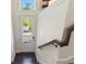 Bright entryway with dark wood floors and staircase leading to the next level at 8478 Karrer Ter, Orlando, FL 32827