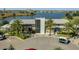 Exterior view of Canvas Restaurant & Market with lakeside dining and colorful design elements at 8478 Karrer Ter, Orlando, FL 32827