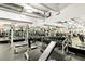 Community gym with weight training equipment, benches and mirrored walls at 101 S Eola Dr # 810, Orlando, FL 32801
