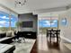 Bright living room boasts floor-to-ceiling windows and modern decor, perfect for entertaining or relaxing at 101 S Eola Dr # 810, Orlando, FL 32801