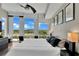 Bright main bedroom featuring large windows and hardwood floors creates a cozy atmosphere at 101 S Eola Dr # 810, Orlando, FL 32801