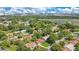 Aerial view of the property, surrounded by lush greenery at 10148 Eventide Ct, Orlando, FL 32821