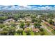 Aerial view of the property, surrounded by lush greenery at 10148 Eventide Ct, Orlando, FL 32821