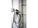 Garage featuring an installed Electric Vehicle Charger and access to garage door at 10148 Eventide Ct, Orlando, FL 32821