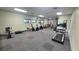 Community gym featuring treadmills, bikes, and weight machines with ample space at 10148 Eventide Ct, Orlando, FL 32821