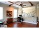 Versatile bonus room with wood floors, beam ceiling and bright natural light at 11013 Ullswater Ln, Windermere, FL 34786