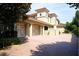 Spacious three-car garage with white doors offering ample parking and storage space at 11013 Ullswater Ln, Windermere, FL 34786