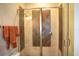 Modern glass shower showcasing decorative tile, providing a clean and elegant space at 11013 Ullswater Ln, Windermere, FL 34786